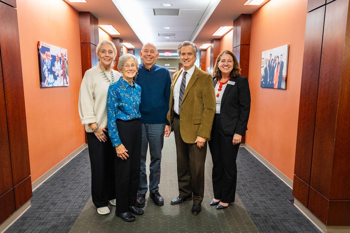 Karen Abraham, provost; Giles Jackson, associate professor and director of the Institute for Business, Sustainability and Society; David Baxa; Lynn Baxa; and Astrid Sheil, dean of the business school, pose for a photo